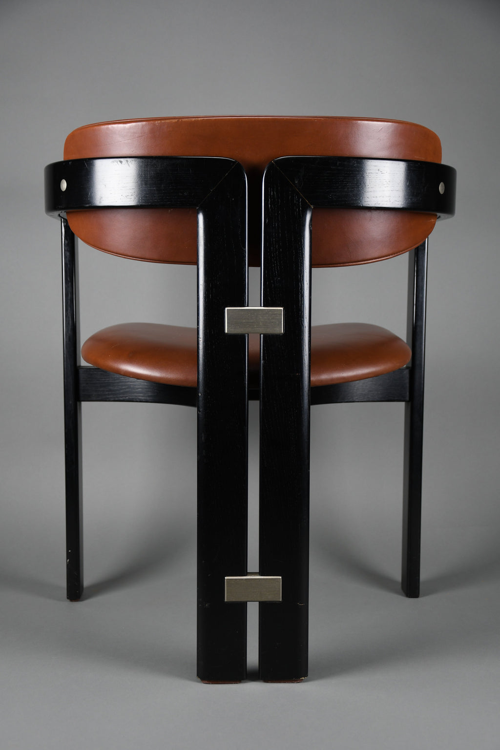 1960s Pamona armchair by Augusto Savini for Pozzi Italy – sculptural black lacquer & cognac leather - Furniture