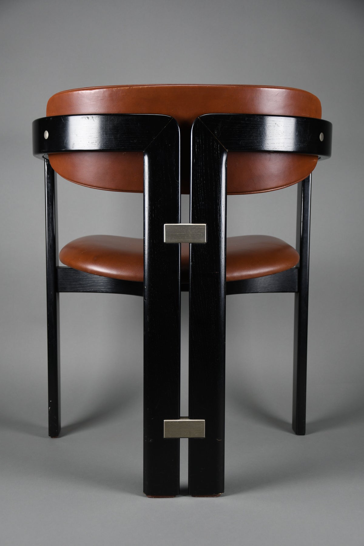 1960s Pamona armchair by Augusto Savini for Pozzi Italy – sculptural black lacquer & cognac leather - Furniture