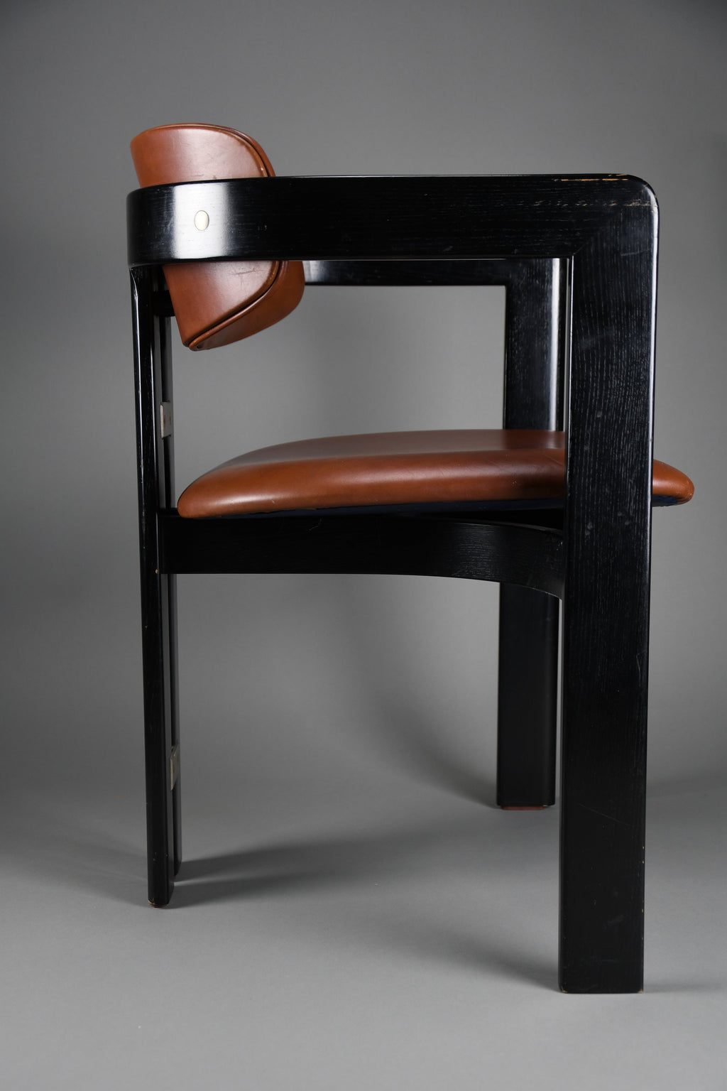 1960s Pamona armchair by Augusto Savini for Pozzi Italy – sculptural black lacquer & cognac leather - Furniture