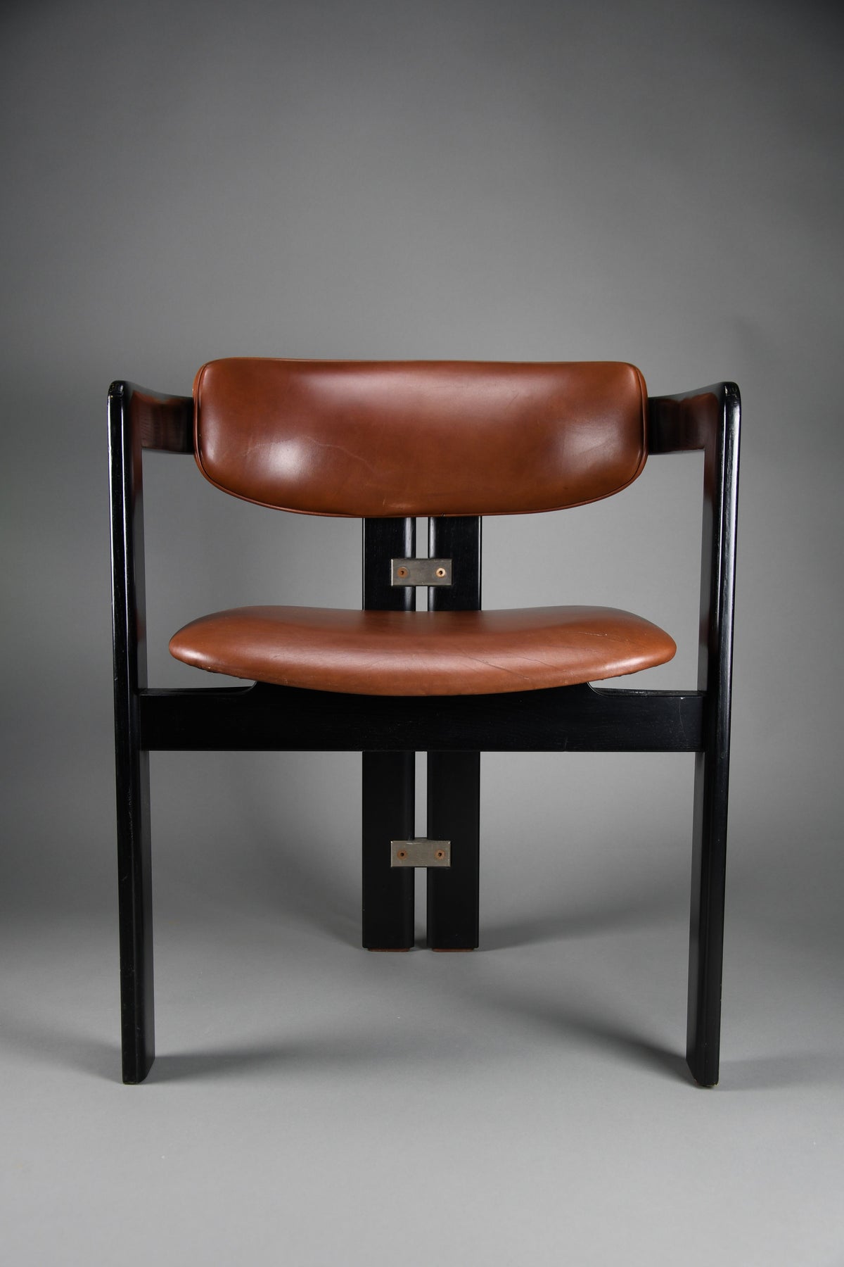 1960s Pamona armchair by Augusto Savini for Pozzi Italy – sculptural black lacquer & cognac leather - Furniture