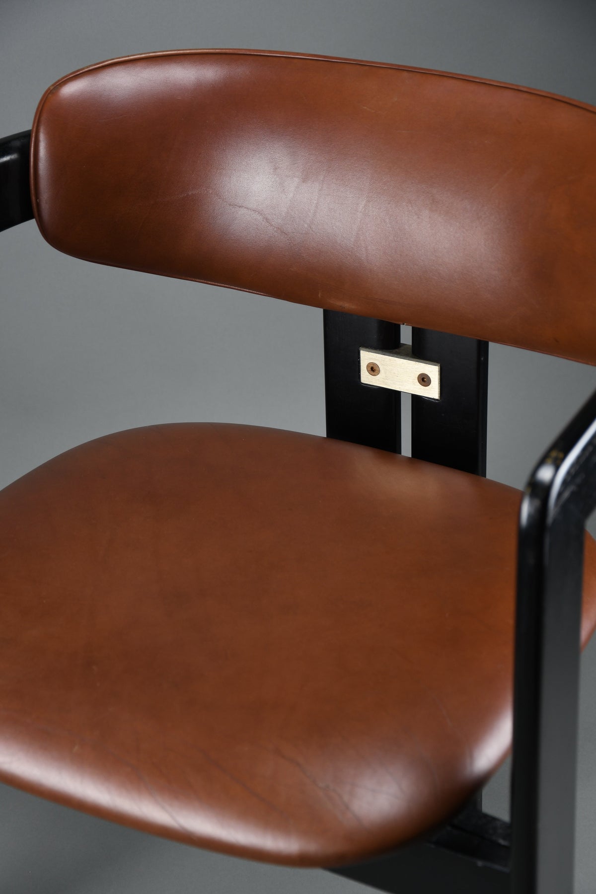 1960s Pamona armchair by Augusto Savini for Pozzi Italy – sculptural black lacquer & cognac leather - Furniture