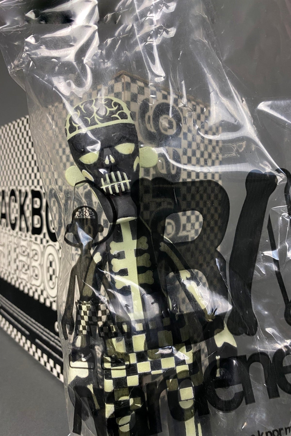 GLOW IN THE DARK BLACK BODY WHITE BONE 2006 DESIGNER TOY BY MICHAEL LAU - Art Toys