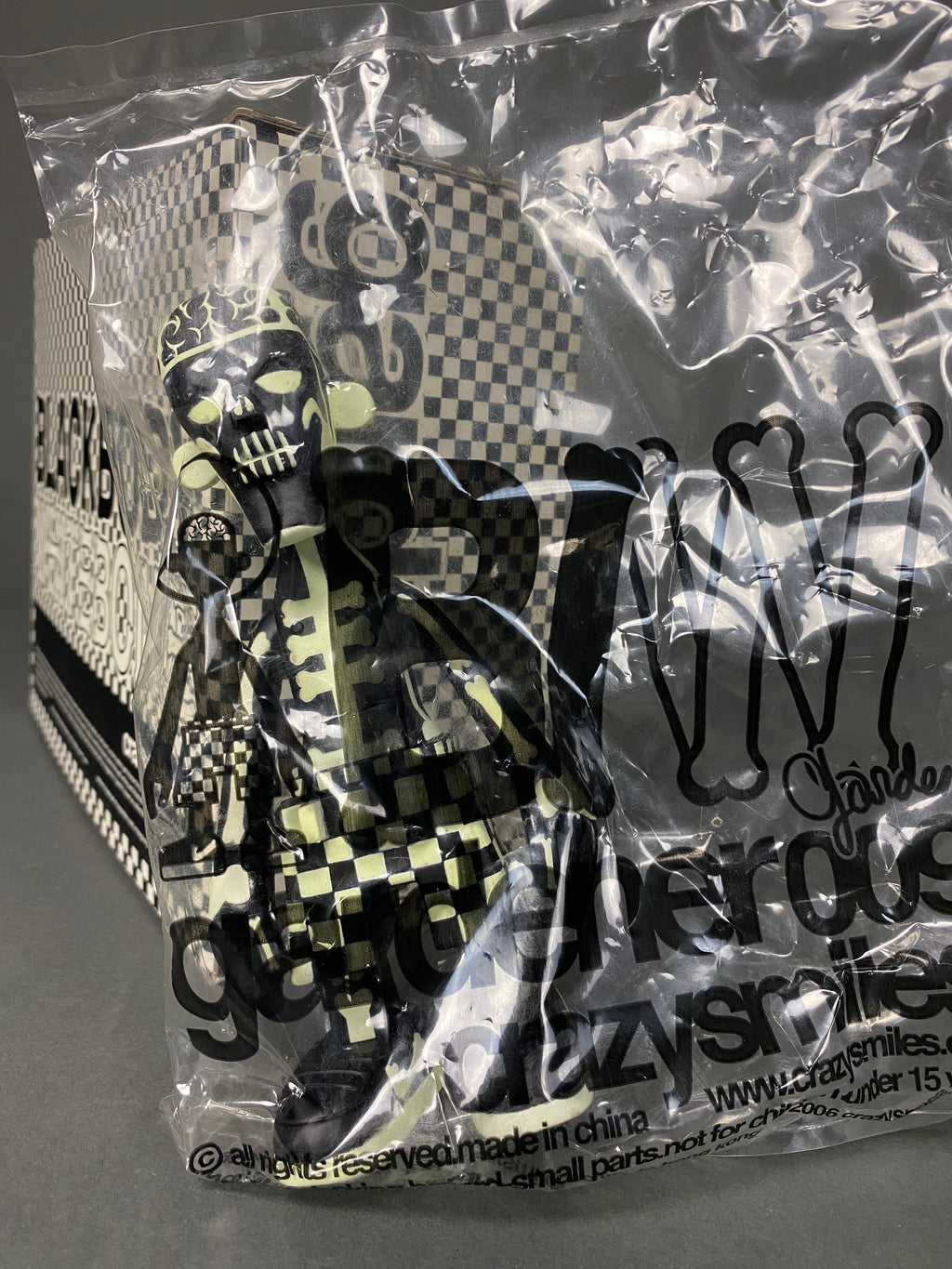 GLOW IN THE DARK BLACK BODY WHITE BONE 2006 DESIGNER TOY BY MICHAEL LAU - Art Toys