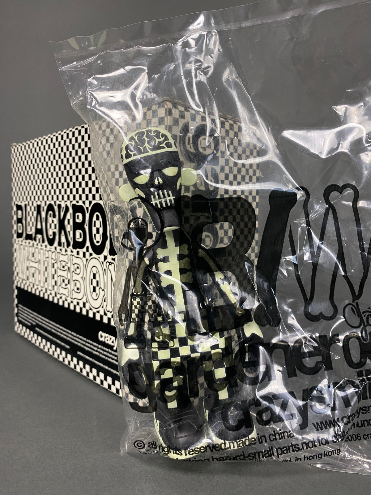GLOW IN THE DARK BLACK BODY WHITE BONE 2006 DESIGNER TOY BY MICHAEL LAU - Art Toys